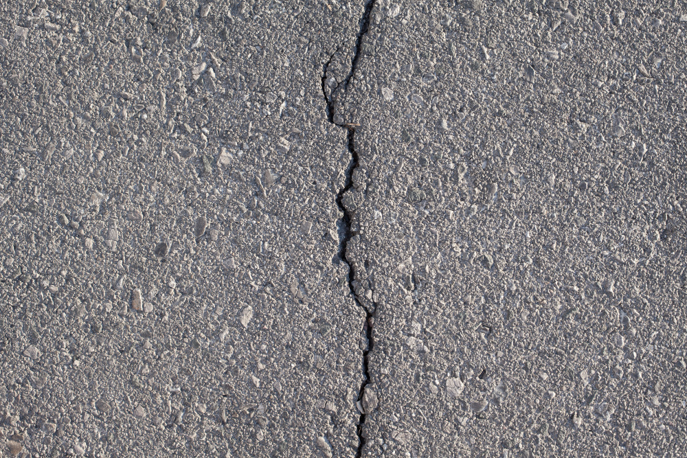 How to Repair Cracks in Asphalt Driveways