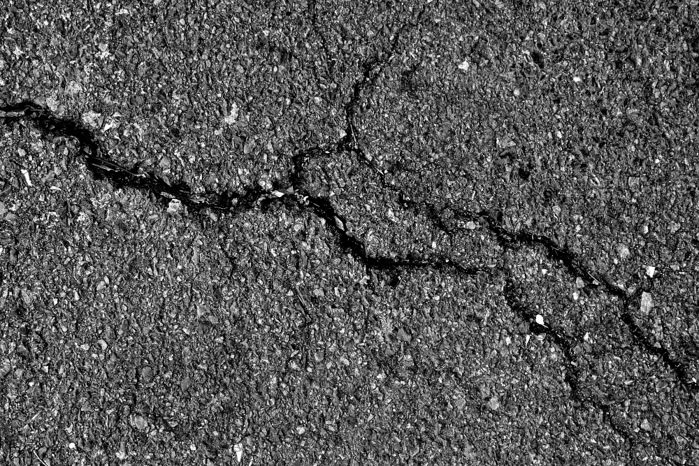 The Importance of Crack Filling Before Seal Coating Your Pavement