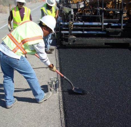 Workers on a new asphalt consruction