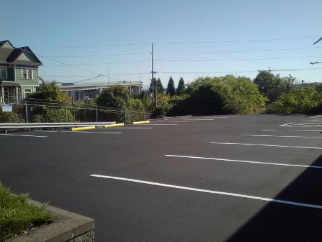 A well-maintained asphalt parking lot